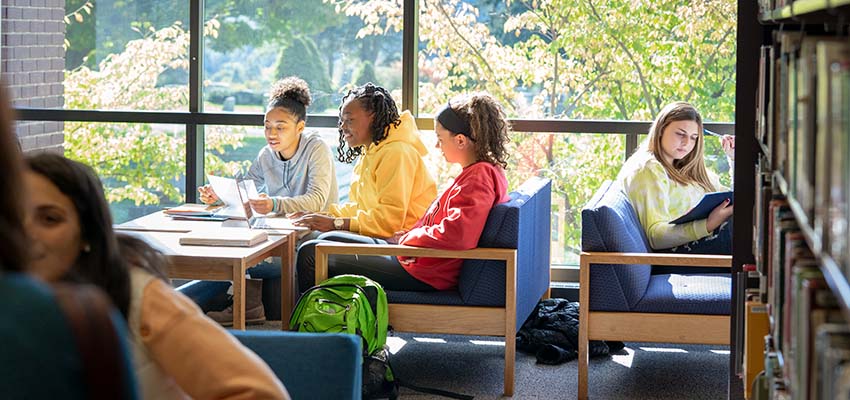 Students working together in a common space in Memorial Library