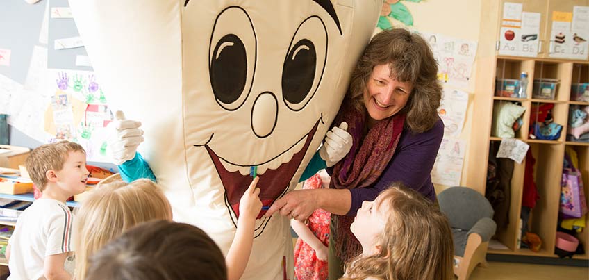 Young students learning about dental health