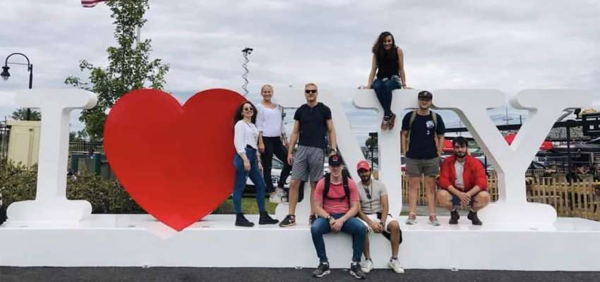 Students posing with I Heart NY sign