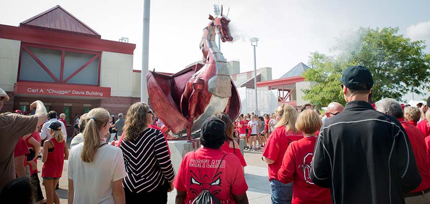 Crowd gathered at the Red Dragon Sculpture reveal