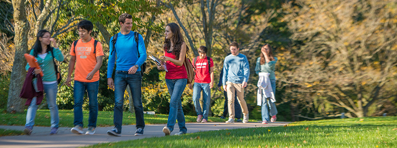 International students walking outside Old Main