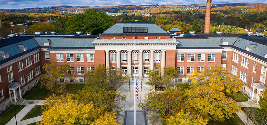 Old Main aerial from the front in the fall