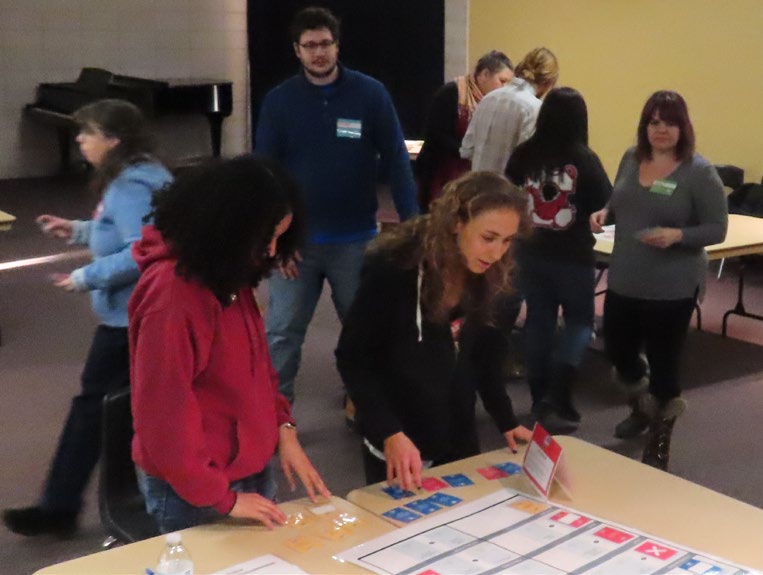 Students working at event