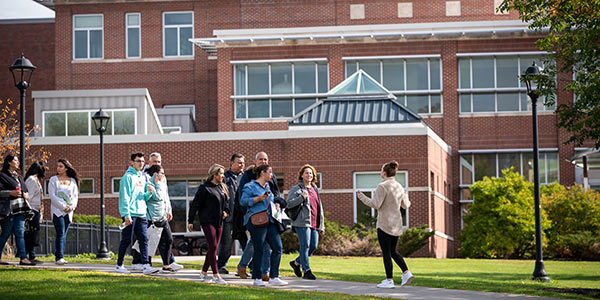 Prospective students and parents taking a tour