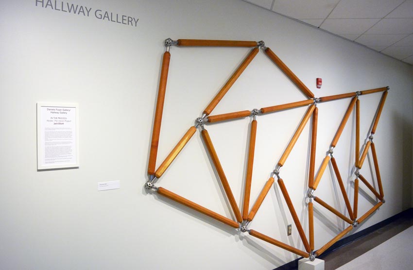 View into the west Hallway Gallery/Daniels Foyer Gallery at Dowd Fine Arts Center featuring modular installation produced by Ithaca-based sculptor Jack Elliott.