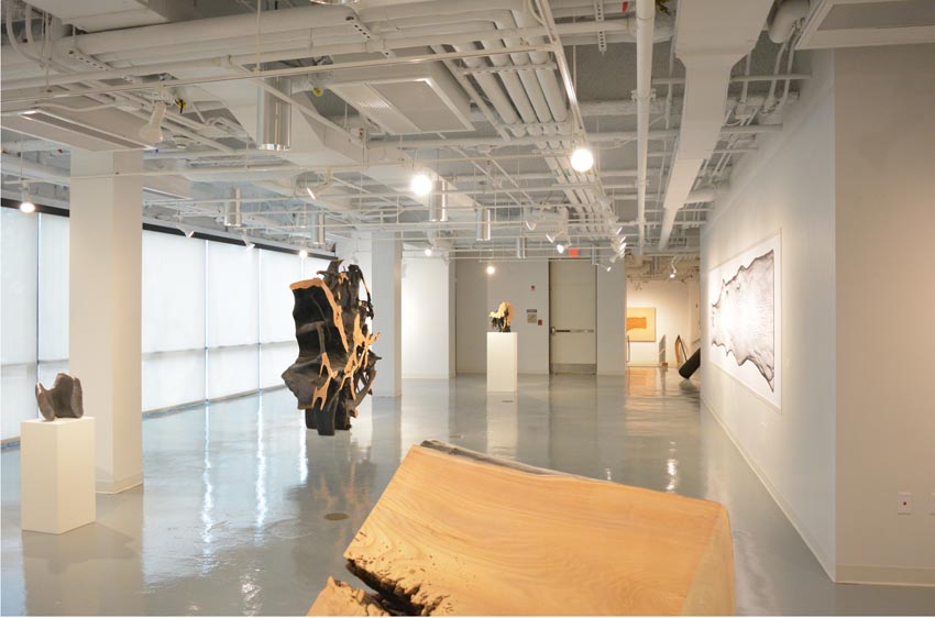 View into the central gallery at Dowd Gallery featuring sculptural objects produced by Ithaca-based sculptor Jack Elliott.