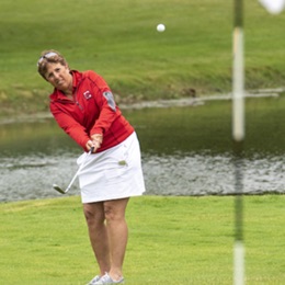 Woman playing golf